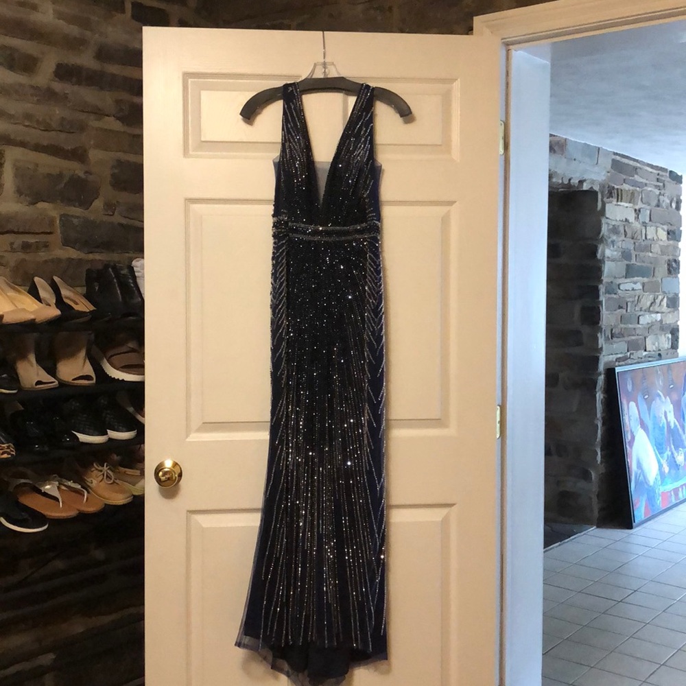 Full length, fully beaded (front & back) gown.